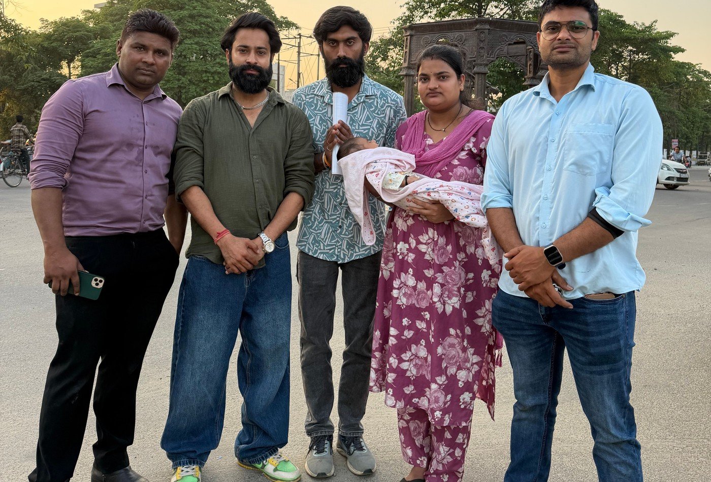Founder and volunteers providing medical care and support for critically ill infants